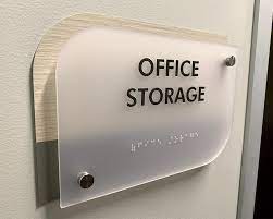 ADA complaint sign for office storage and braille.