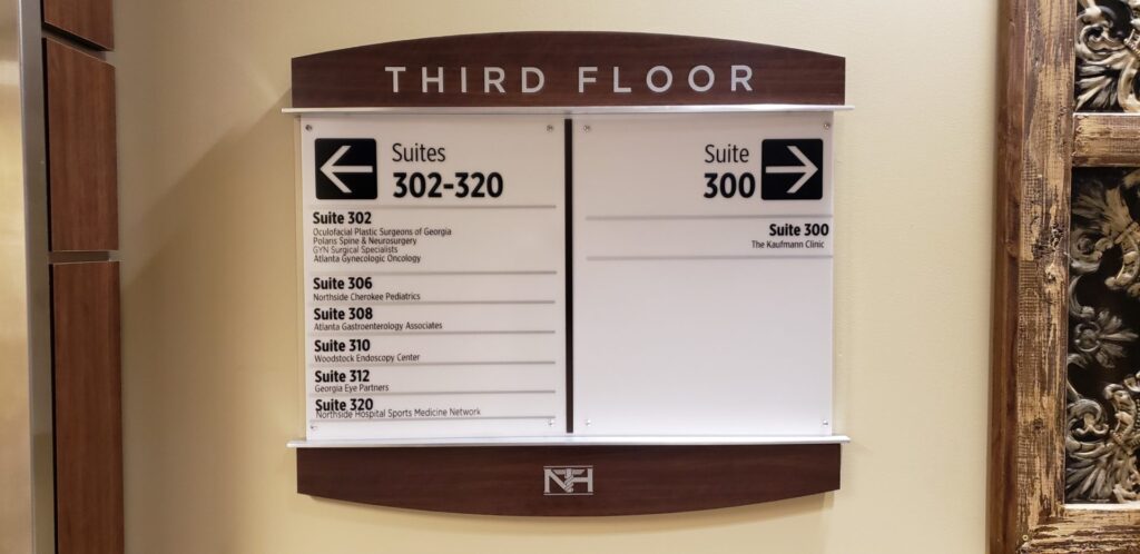 Interior directory sign for multiple health care business.